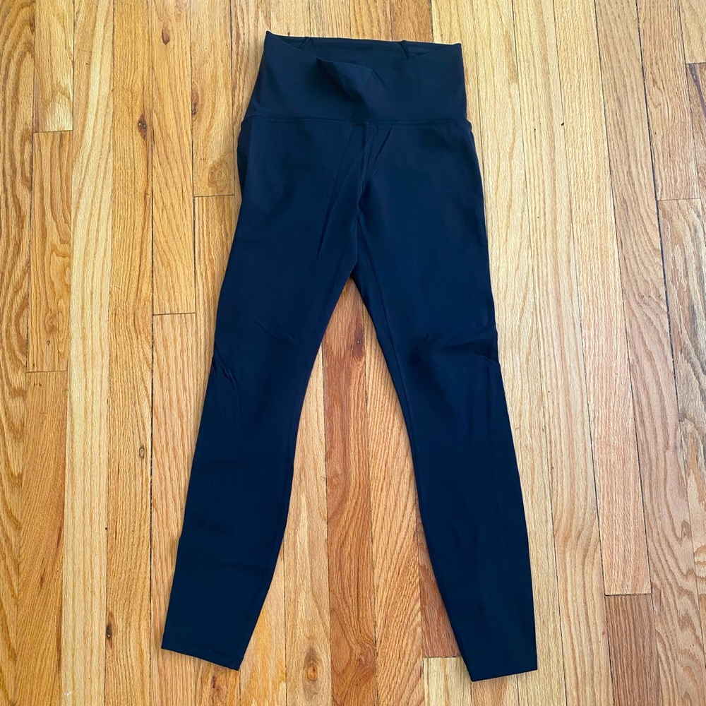 Lululemon Size 4 Wunder Under Pants with mesh at bottom. Barely worn!